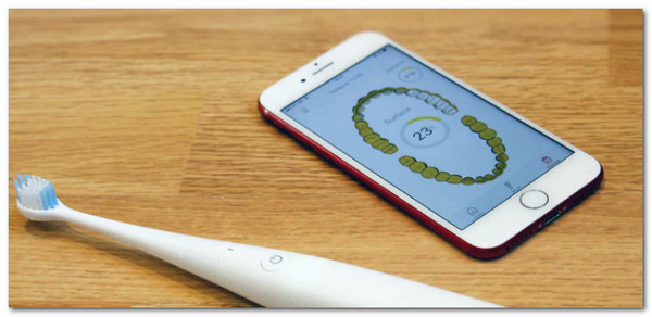 cleam iphone speaker with toothbrush